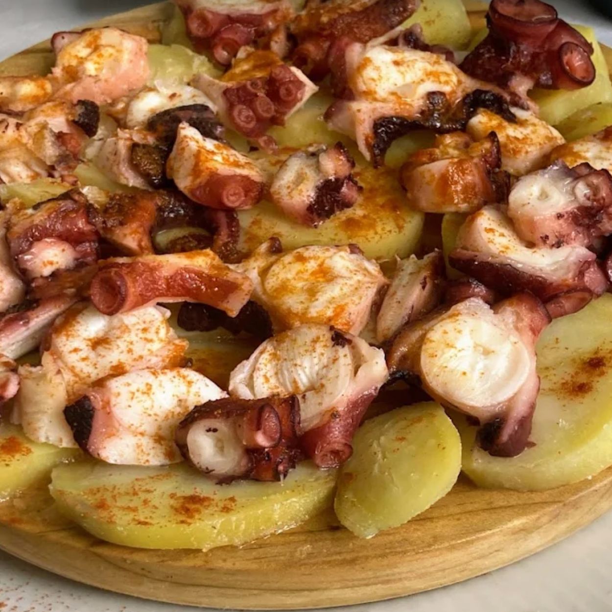 Pulpo - CASA ANSELMO RESTAURANTE CARNES A LA BRASA
